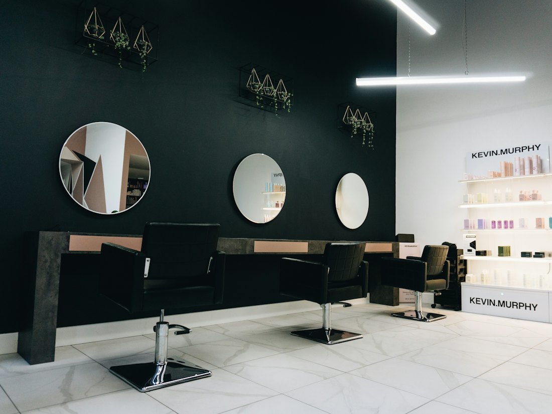 Bright hair salon with styling stations